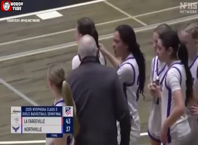 Video :Coach fired after pulling player by the hair